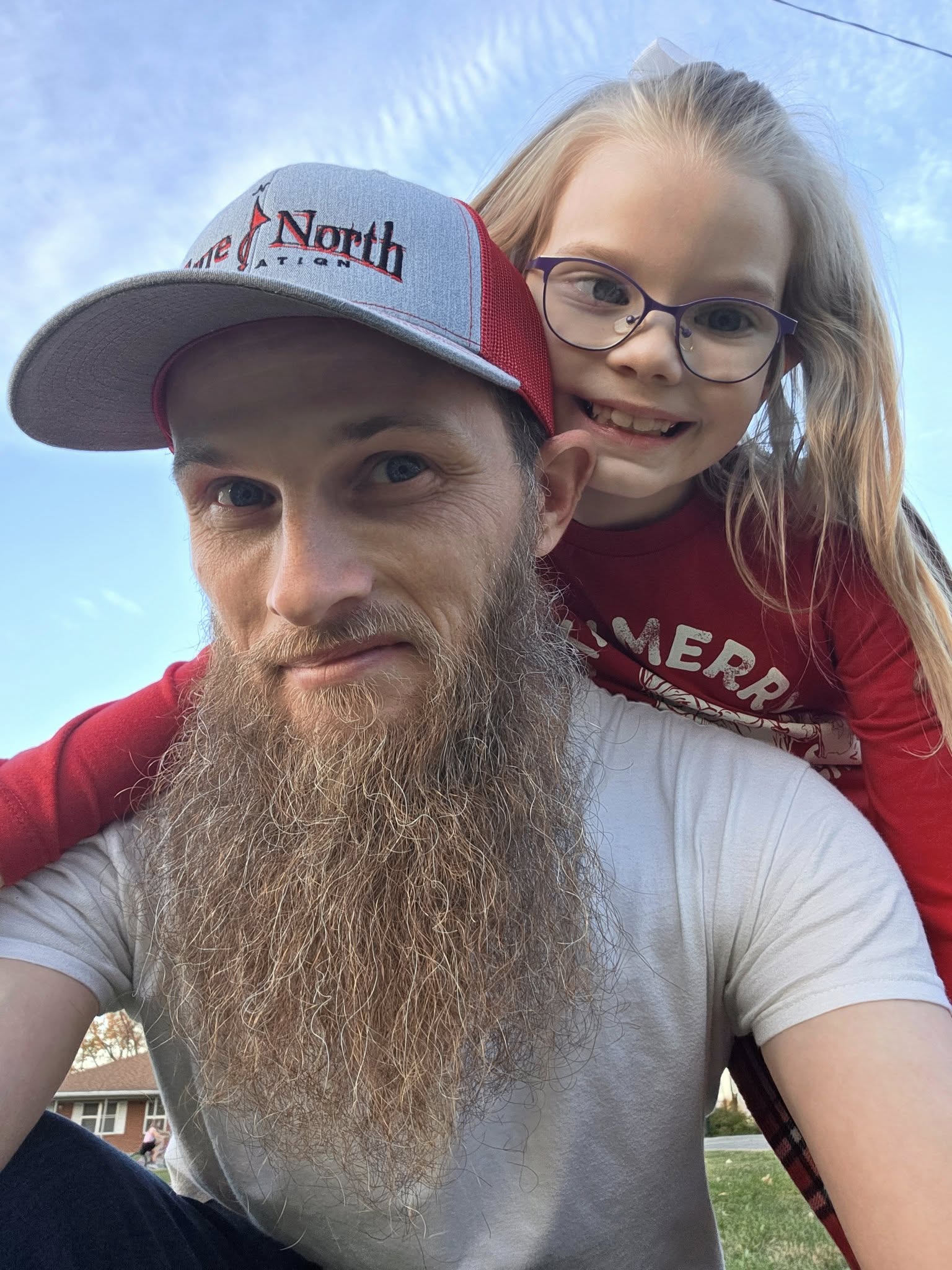 David with his daughter outdoors